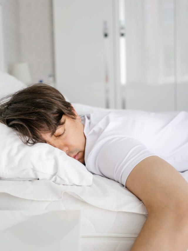 Young-man-sleeping-soundly-in-bed-scaled